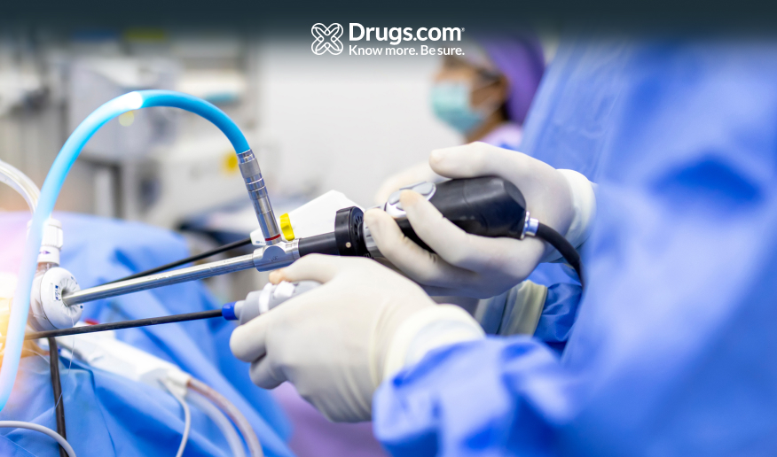 Doctor performing an endoscopic procedure inside an operating room in a hospital