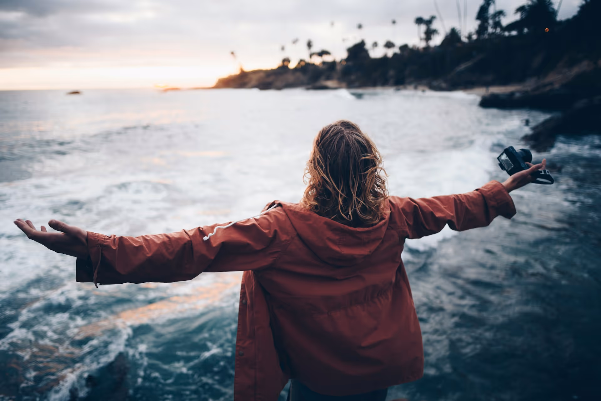 Woman near water with a sense of freedom