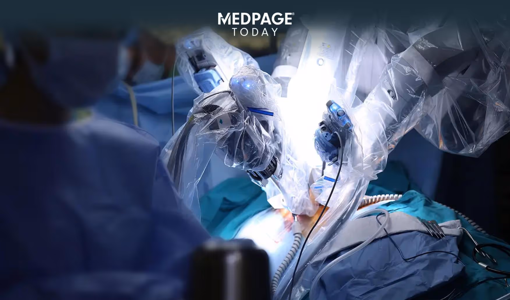 A photo of surgeons performing robot-assisted gastric surgery